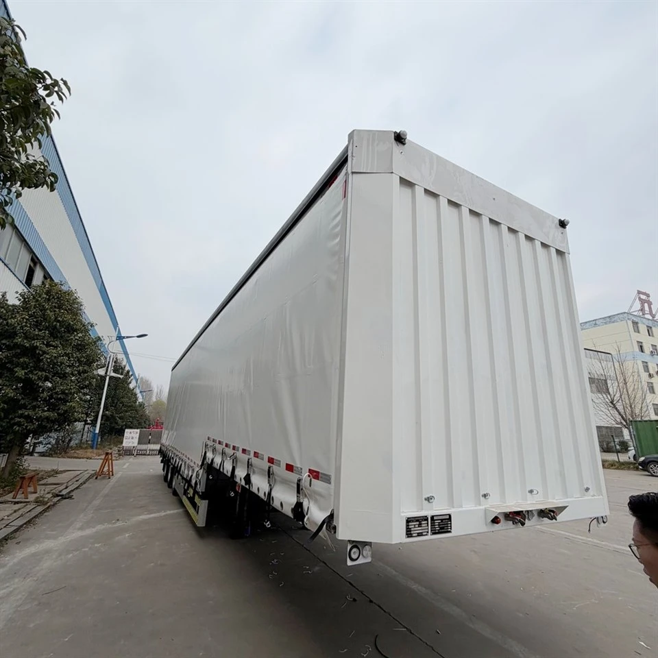 Semi-remorque conteneur-à rideaux latéraux-